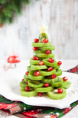 Kiwi pomegranate Christmas tree, beautiful New Year background