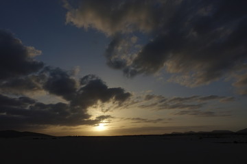 Sunset over the sand dunes in the Natural Park in Fuerteventura,Canary Islands,Spain.