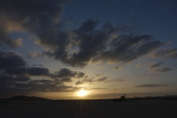 Sunset over the sand dunes in the Natural Park in Fuerteventura,Canary Islands,Spain.