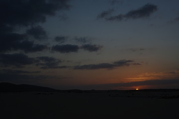 Sunset over the sand dunes in the Natural Park in Fuerteventura,Canary Islands,Spain.