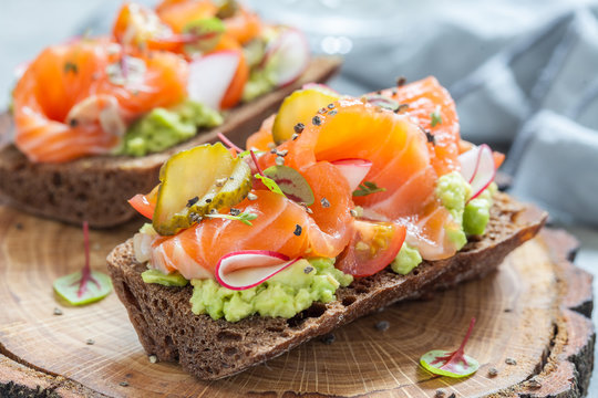 Danish Open Sandwich Smorrebrod With Salmon On Rye Bread