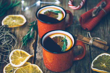 Christmas drink (winter hot drink). Mulled wine punch and spices for glintwine on vintage wooden table background top view.