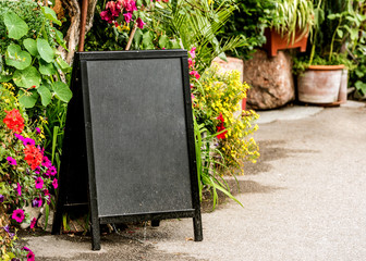 View of black advertisement blackboard on the street