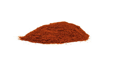 Cayenne pepper spice isolated on a white background cutout. Pile of red paprika powder.
