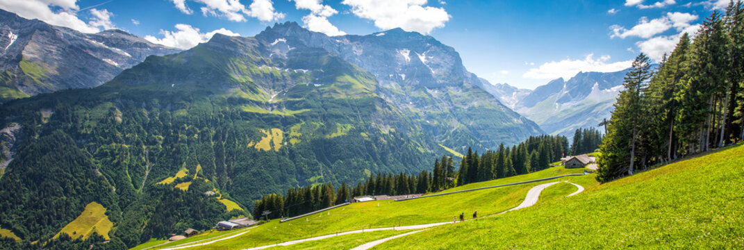 Elm village and Swiss mountains - Piz Segnas, Piz Sardona, Laaxer Stockli from Ampachli, Glarus, Switzerland, Europe