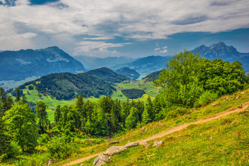 Naklejka na ściany i meble Swiss Alps near Burgenstock with the view of Lake Lucerne and Pilatus mountain, Switzerland, Europe.