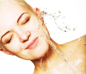woman with clean skin with splash of water