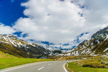 Road amoung snowy Alps mountains, Fluelapass, Davos,  Graubuende