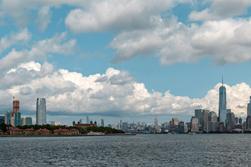 New York City / USA - AUG 22 2018: Manhattan skyscrapers and Ellis Island view from the Statue of...