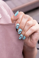 nail art manicure with colorful polish nails. Beauty hand and stylish nails.