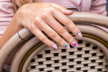 nail art manicure with colorful polish nails. Beauty hand and stylish nails.
