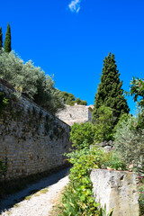 Ruins of the medieval city walls in the village of Oppede-le-Vieux in the Luberon area of Provence, France