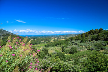 Panorama of the countryside of the Luberon as seen from the village of Oppede-le-Vieux in Provence,...