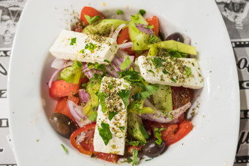 Freshly prepared Greek salad with feta cheese
