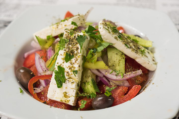 Freshly prepared Greek salad with feta cheese