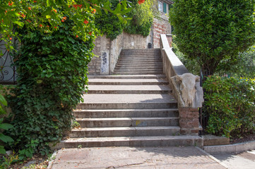 Narrow Verona strees to Castel San Pietro during summer season