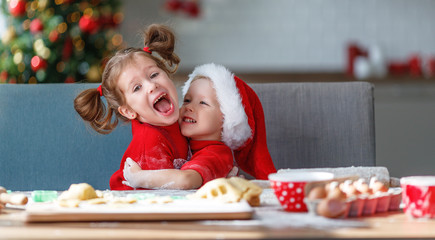 happy children bake christmas cookies