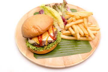 cheese burger served with french fried vegetable salad on wooden plate , white background