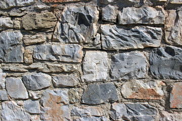Stone brick wall detail background 