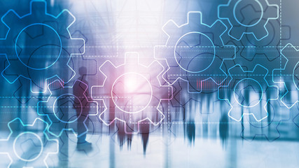 Double exposure gears mechanism on blurred background. Business and industrial process automation...