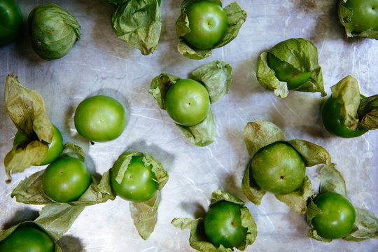 Peeled and Unpeeled Tomatillo Peppers