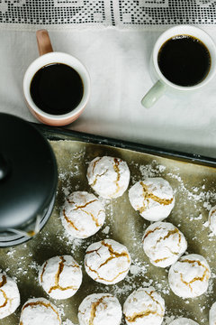 Two espresso with freshly baked Amaretti biscuits