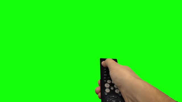 Remote control television changing one channel . Green screen