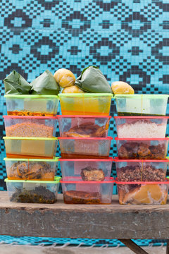 Numerous containers filled with food