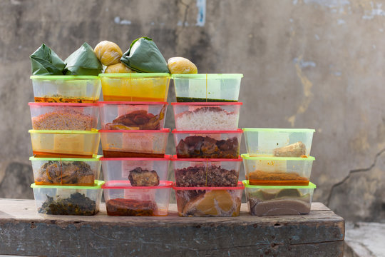 Numerous containers filled with food