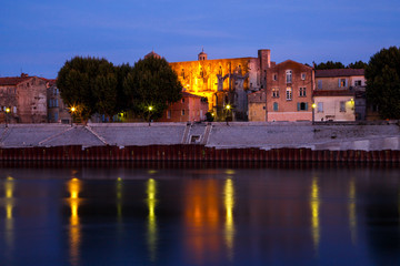 Arles, view to historical town from the river. Twilight, Arles, Provence-Alpes-Cote d'Azur, France.