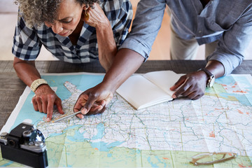 Senior African American Couple planning a trip in retirement