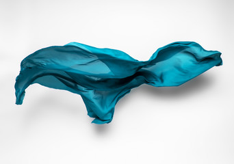 abstract teal fabric in motion