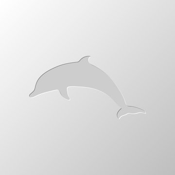 silhouette of dolphin. Paper design. Cutted symbol. Pitted style