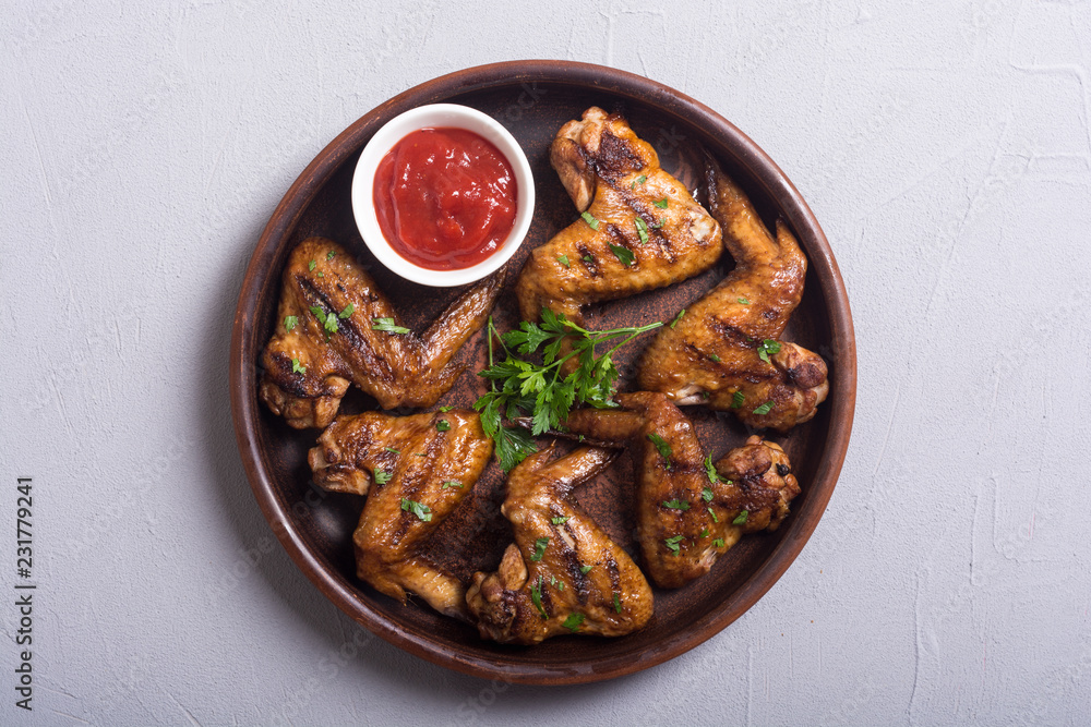 Wall mural grilled chicken wings with tomato sauce