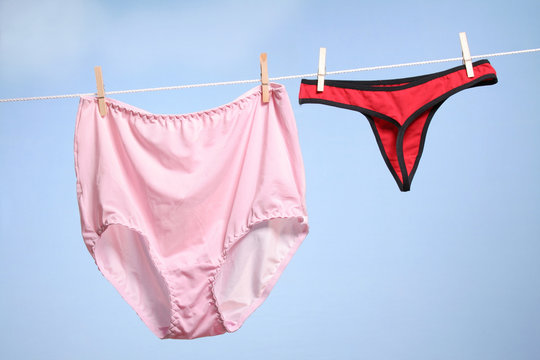 Granny's panties and sexy thong hanging on a clothesline