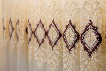 Beautiful thin curtains texture, transparent tulle, examples in the store