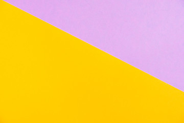 Pastel colored paper flat lay top view, background texture, pink, purple, yellow, orange