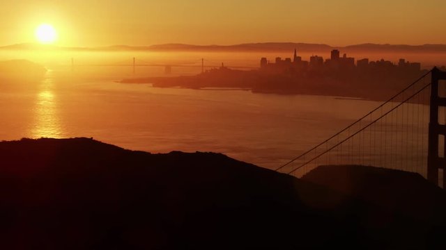 Aerial sunrise view Golden Gate Bridge San Francisco city America