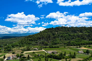 View of the countryside of the Luberon as seen from the medieval village of Menerbes in Provence, France