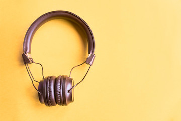 Headphones on colorful background.