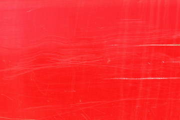 Fototapeta premium Scratched red automobile door panel lines detail horizontal background 