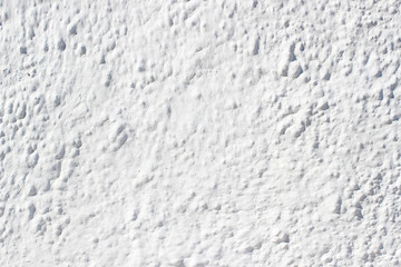 White uneven historical building outer wall detail texture fragment background specks streaks