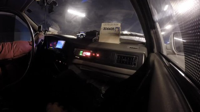 Time lapse of a taxi ride in Shanghai, China at night.