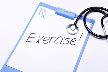 Clipboard showing a special prescription that reads "Exercise!"