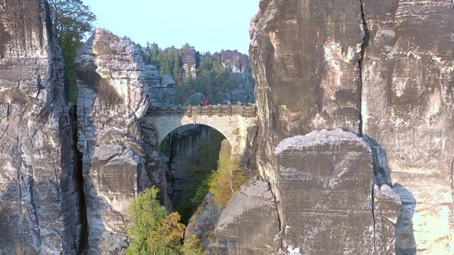 Bridge Crossing an Incredible Rock Formation at Sunset