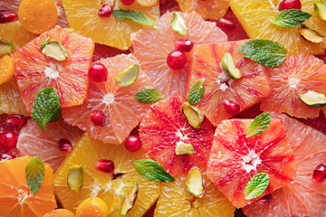 Citrus fruit slices with mint leaf