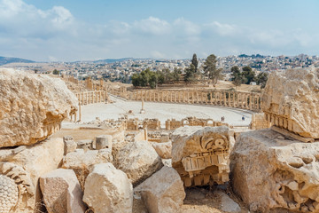 Oval Forum in the ancient Roman city of Gerasa, preset-day Jerash, Jordan. It is located about 48 km north of Amman. - obrazy, fototapety, plakaty