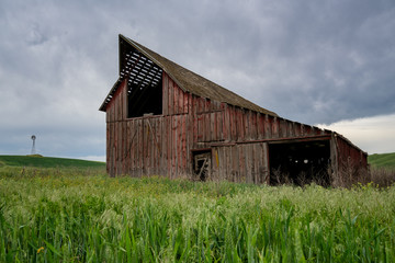 old red barn and windmill