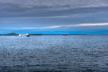 Speed boat taking tourists to Saint Ignace Michigan in the Upper Peninsula