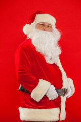 Photo of happy Santa Claus in eyeglasses looking at camera